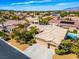 Single-story house with tile roof, three-car garage and pool at 7410 Apple Springs Ave, Las Vegas, NV 89131