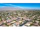 Aerial view of houses and community, mountains in the background at 7410 Apple Springs Ave, Las Vegas, NV 89131