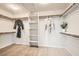 Spacious walk-in closet with shelving and hanging rods at 7410 Apple Springs Ave, Las Vegas, NV 89131