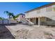 Spacious backyard with patio cover and storage shed at 913 Evening Fawn Dr, North Las Vegas, NV 89031