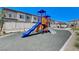 Community playground with play structures at 7332 N Decatur Blvd # 1, North Las Vegas, NV 89131