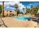 Inviting community pool with surrounding patio at 8452 Boseck Dr # 123, Las Vegas, NV 89145