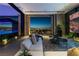 Living area with panoramic windows and city views at 685 Dragon Peak Dr, Henderson, NV 89012