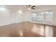 Bright living room featuring hardwood floors and large windows at 697 Oakmont Ave # 3311, Las Vegas, NV 89109