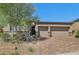 One-story house with brown garage doors and brick accents at 97 Juliette Pointe Ln, Henderson, NV 89011