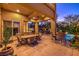 Spacious backyard patio with seating area, and views of the pool at 2994 San Lorenzo Ct, Henderson, NV 89052