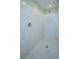 Large walk-in shower with marble walls and tiled flooring at 9883 Russian Hill St, Las Vegas, NV 89141