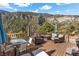 Deck with mountain views, comfortable seating, and a fire pit at 324 Crestview Dr, Mount Charleston, NV 89124