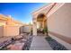 Landscaped front yard with stone pathway and mature plants at 2619 White Pine Dr, Henderson, NV 89074