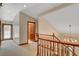 Upper hallway with access to exterior and bathroom at 3734 Mahalo Cir, Logandale, NV 89021