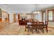 Bright dining area with hardwood floors and built in cabinetry, adjacent to living area at 3734 Mahalo Cir, Logandale, NV 89021