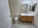 Bathroom with single sink vanity, tile flooring, and shower at 2110 Los Feliz St # 1036, Las Vegas, NV 89156