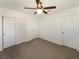 Bedroom with double door closet and ceiling fan at 4536 Del Pappa Ct, Las Vegas, NV 89130