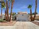 Two-story house with attached garage and desert landscaping at 4536 Del Pappa Ct, Las Vegas, NV 89130