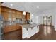 Modern kitchen with granite countertops and light wood cabinets at 45 Moltrasio Ln, Henderson, NV 89011