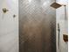 Contemporary shower with herringbone-patterned tiles and sleek fixtures at 3640 Ash Springs Way, Las Vegas, NV 89129