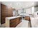 Modern kitchen with stainless steel appliances and a large island at 3640 Ash Springs Way, Las Vegas, NV 89129