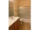 Clean bathroom with a tub/shower combo, vanity, and tile flooring at 3733 Budenny Dr, Las Vegas, NV 89122