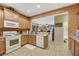 Spacious kitchen with ample cabinetry, stainless steel appliances, and a breakfast bar at 3733 Budenny Dr, Las Vegas, NV 89122