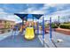 Modern playground with climbing structures and slides at 6984 Smiling Cloud Ave, Henderson, NV 89011