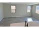 Bright living room featuring tile floors and neutral wall colors at 7215 Stockton Dunes St, North Las Vegas, NV 89084