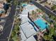 Aerial view of community pool and surrounding buildings at 11298 Cactus Tower Ave # 102, Las Vegas, NV 89135