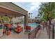 Relaxing pool area with lounge chairs and covered seating at 8600 W Charleston Blvd # 1092, Las Vegas, NV 89117