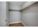 Spacious walk-in closet with double rods and light wood flooring at 8600 W Charleston Blvd # 1092, Las Vegas, NV 89117