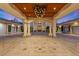 Covered motor court with elegant tilework and chandelier at 9409 Kings Gate Ct, Las Vegas, NV 89145