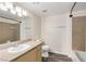 Bathroom with single vanity, tub and shower at 8000 Badura Ave # 2165, Las Vegas, NV 89113