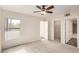 Spacious bedroom with a large window and ceiling fan at 8000 Badura Ave # 2165, Las Vegas, NV 89113