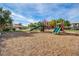 Community playground with wood-chip surface at 8000 Badura Ave # 2165, Las Vegas, NV 89113