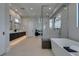 Elegant bathroom with double vanity, soaking tub, and glass shower at 40 Reflection Shores Ln, Henderson, NV 89011