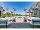 Luxury pool and spa with outdoor seating at 40 Reflection Shores Ln, Henderson, NV 89011