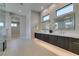 Spa-like bathroom with double vanity and large mirrors at 40 Reflection Shores Ln, Henderson, NV 89011