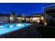 Luxury pool and spa area with outdoor seating at 40 Reflection Shores Ln, Henderson, NV 89011