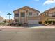 Two-story house with landscaped yard and attached garage at 927 Sterling Thorn Ct, Las Vegas, NV 89183