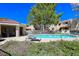 Relaxing pool area with lounge chairs and landscaping at 3791 Desert Marina Dr # 109, Laughlin, NV 89029