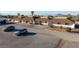 Exterior view of a commercial building with parking lot and landscaping at 241 Palo Verde Dr, Henderson, NV 89015