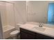 Bathroom with a bathtub, toilet, and vanity at 7334 N Decatur Blvd # 6, North Las Vegas, NV 89084