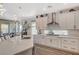 Modern kitchen with white cabinets, stainless steel appliances, and a large island at 41 Sun Mirage Ave, Henderson, NV 89011