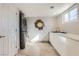 Bright laundry room with stackable washer and dryer at 2890 Belcastro St, Las Vegas, NV 89117