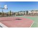 Community basketball court with two hoops at 6816 Alpine White Ct, North Las Vegas, NV 89086