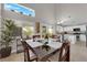 Kitchen and dining area with high ceilings and an abundance of natural light at 2098 Merano Ct, Las Vegas, NV 89123