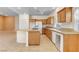 Bright kitchen with island, ample cabinetry, and stainless steel appliances at 85 Alerion St, Las Vegas, NV 89138