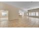 Large living area with open kitchen view and tile flooring at 85 Alerion St, Las Vegas, NV 89138