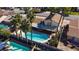 Aerial view showing home with pool and palm trees; desirable location near schools at 4020 Shadow Wood Ave, Las Vegas, NV 89121