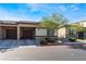 Tan two-car garage home with a landscaped front yard at 7455 Brody Meadows St # 0, North Las Vegas, NV 89084