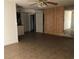 Living room with tiled floors and wood paneled wall at 2639 Heritage Dr, Las Vegas, NV 89121