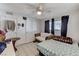 Bedroom with ceiling fan and a daybed at 2309 Constantine Ave, Las Vegas, NV 89101